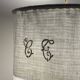 Suspension drap ancien en lin monogramme et oiseau de Georges Braque