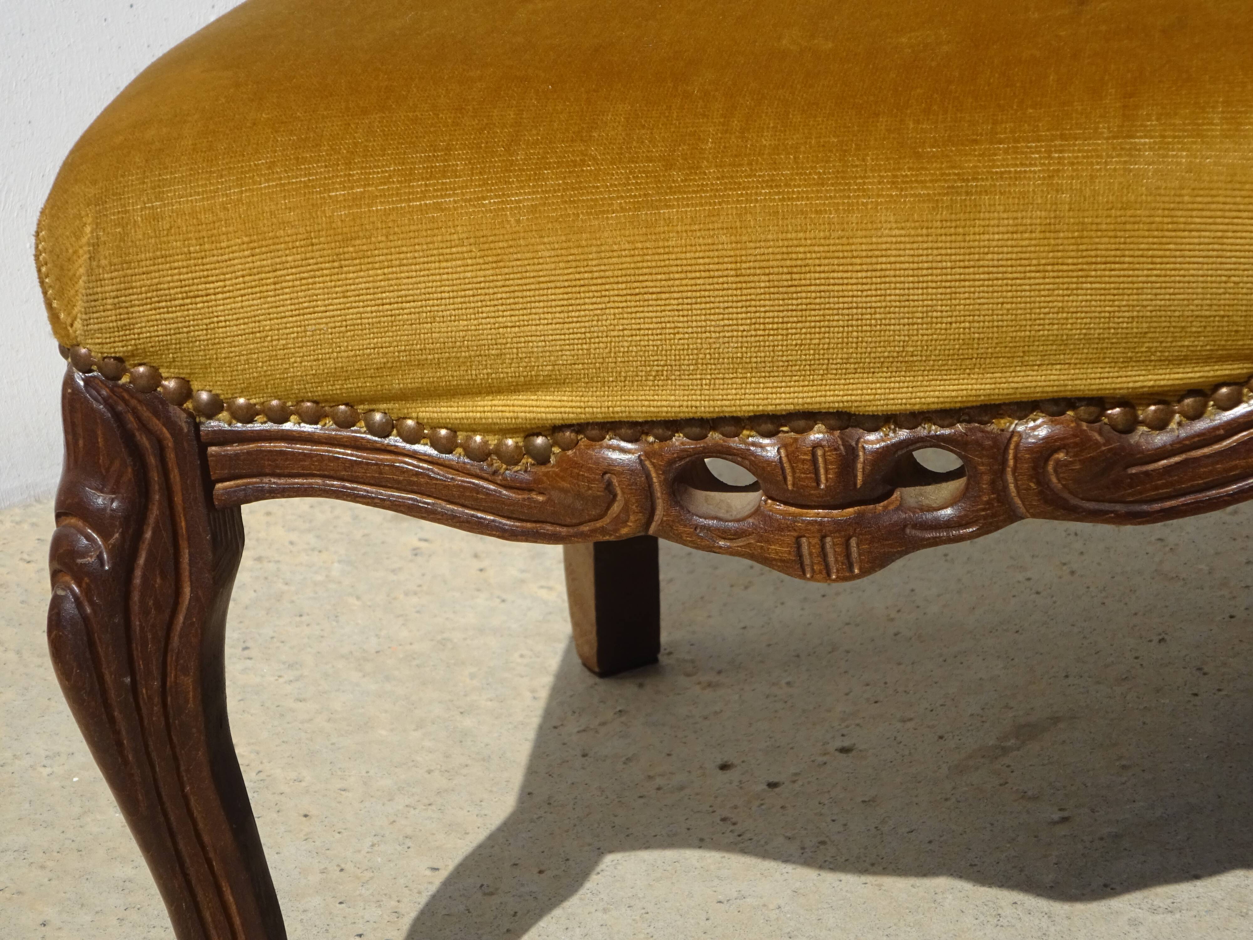 Golden yellow velvet armchairs