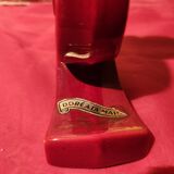 Pair of vintage ceramic candle holders, hand-painted in red and gold.