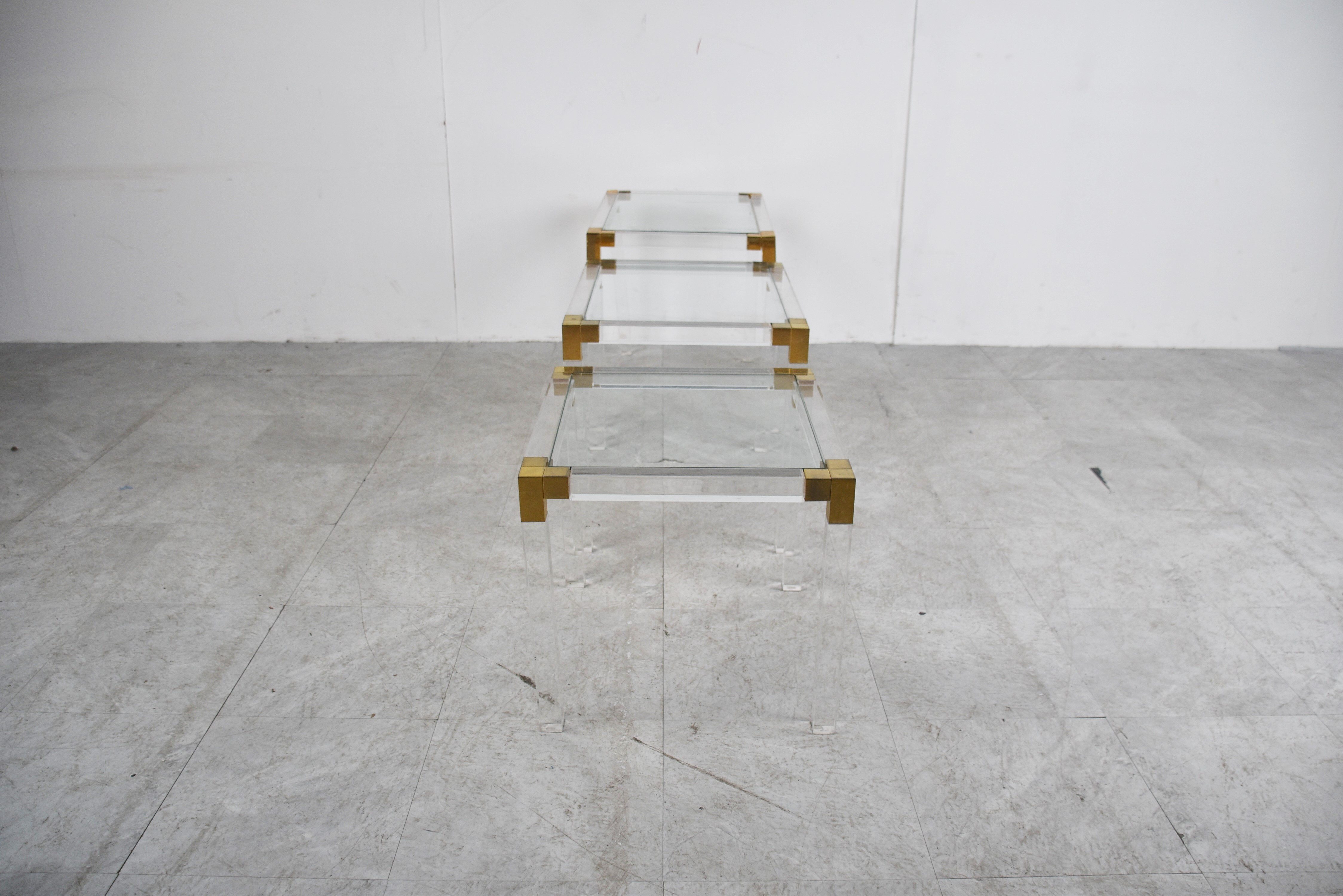 Vintage lucite and brass nesting tables, 1970s