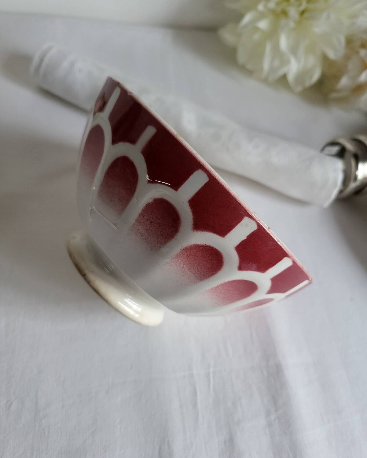 Old bowl in earthenware DIGOIN SARREGUEMINES with faceted burgundy.
