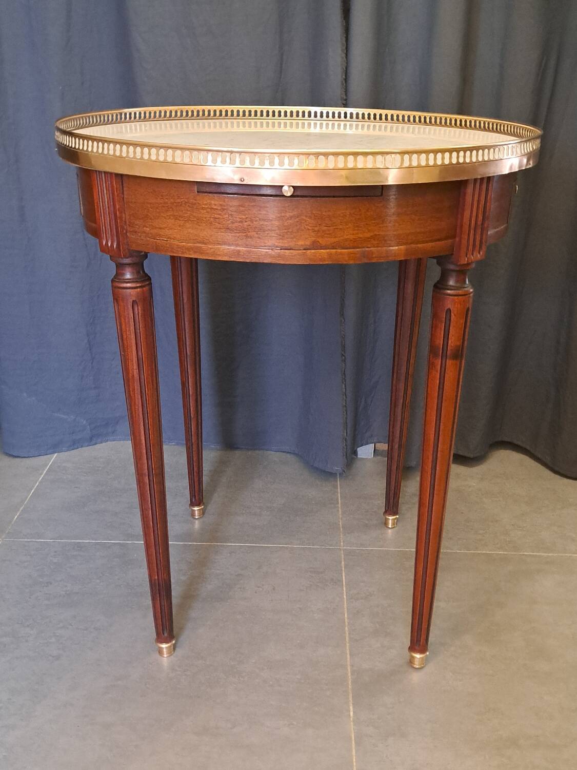 Mahogany and marble bouillotte table