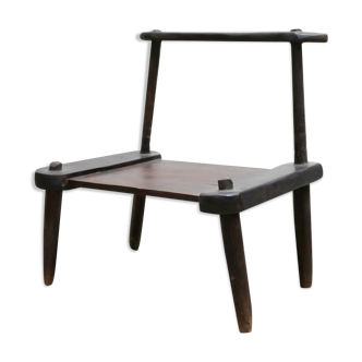 Ancient brutalist African chair