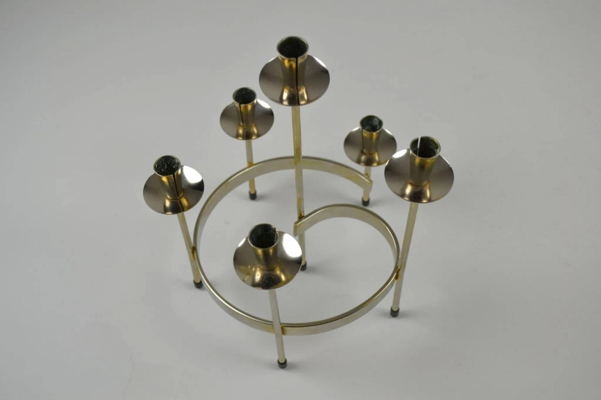 Pair of white metal candle holders "Spiral" by Gunnar Ander for Ystad-Metall, Sweden, 1960s.