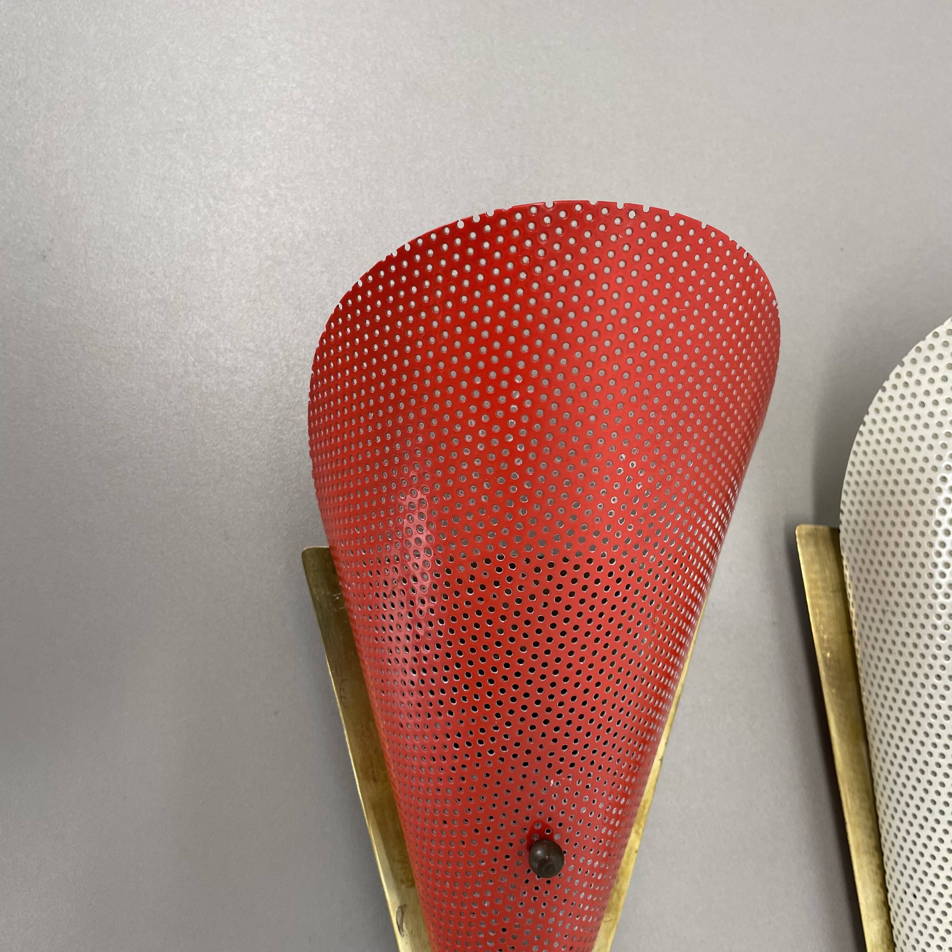 Set of two hole pattern theatre wall light sconces, france, 1950