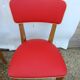 2 vintage red chairs