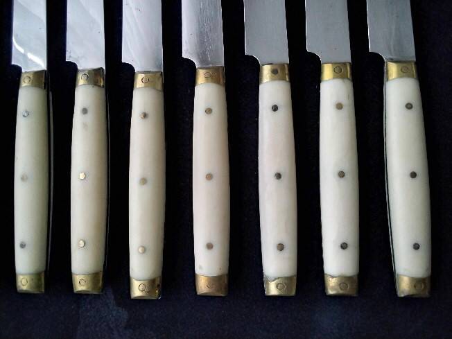 10 Vintage Bakelite, brass and stainless steel cheese knives