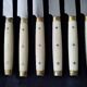 10 Vintage Bakelite, brass and stainless steel cheese knives