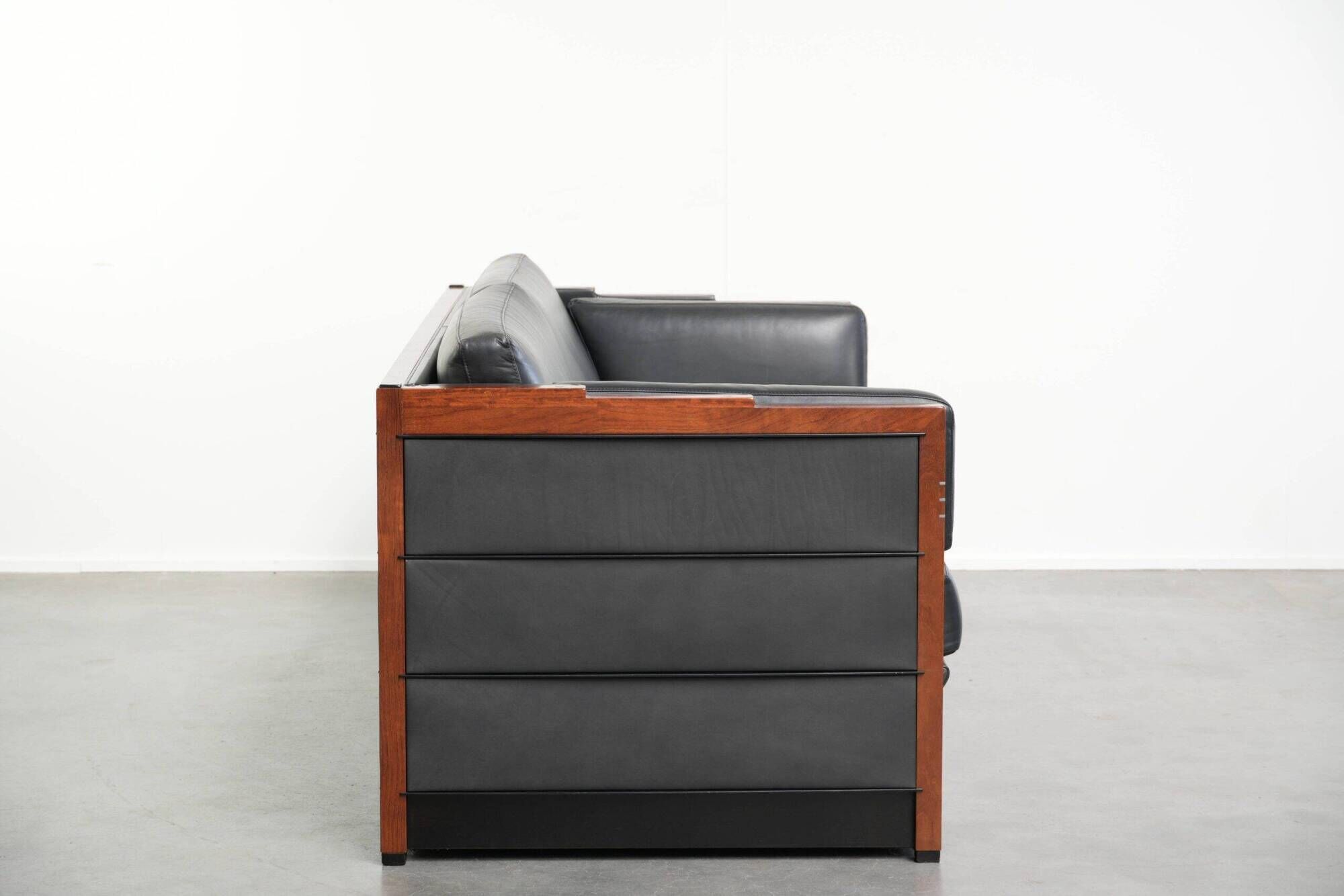 Timeless 3-seater Art Deco design sofa  upholstered in black cowhide leather
