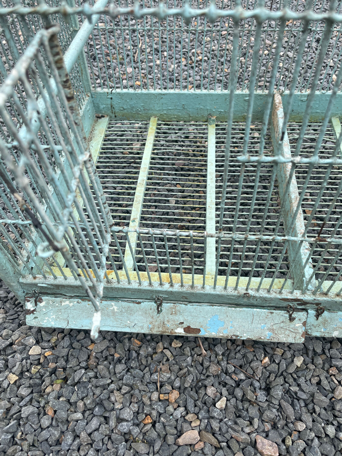 Old wooden and metal birdcage