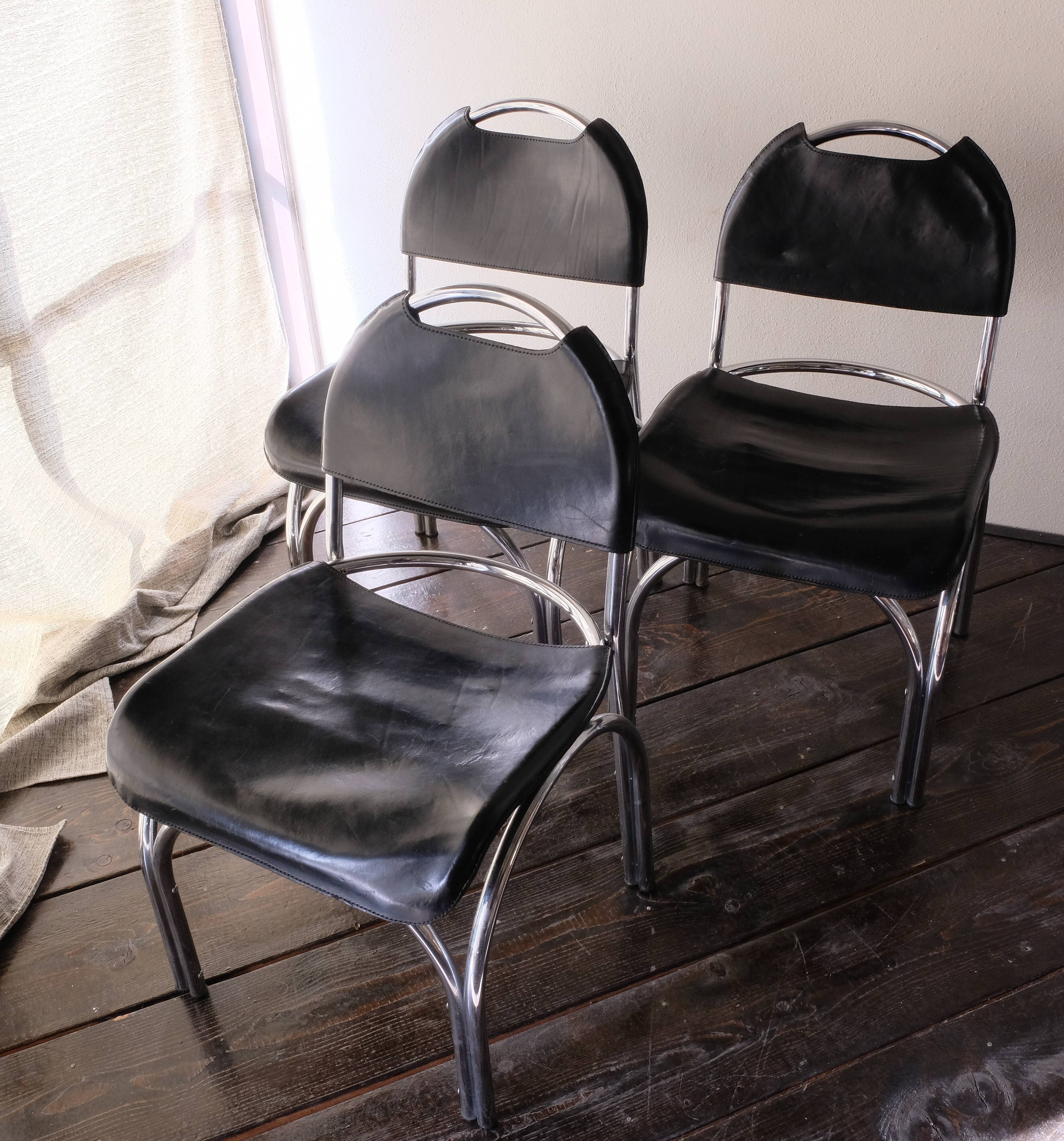 Chairs in black leather, '70
