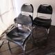 Chairs in black leather, '70