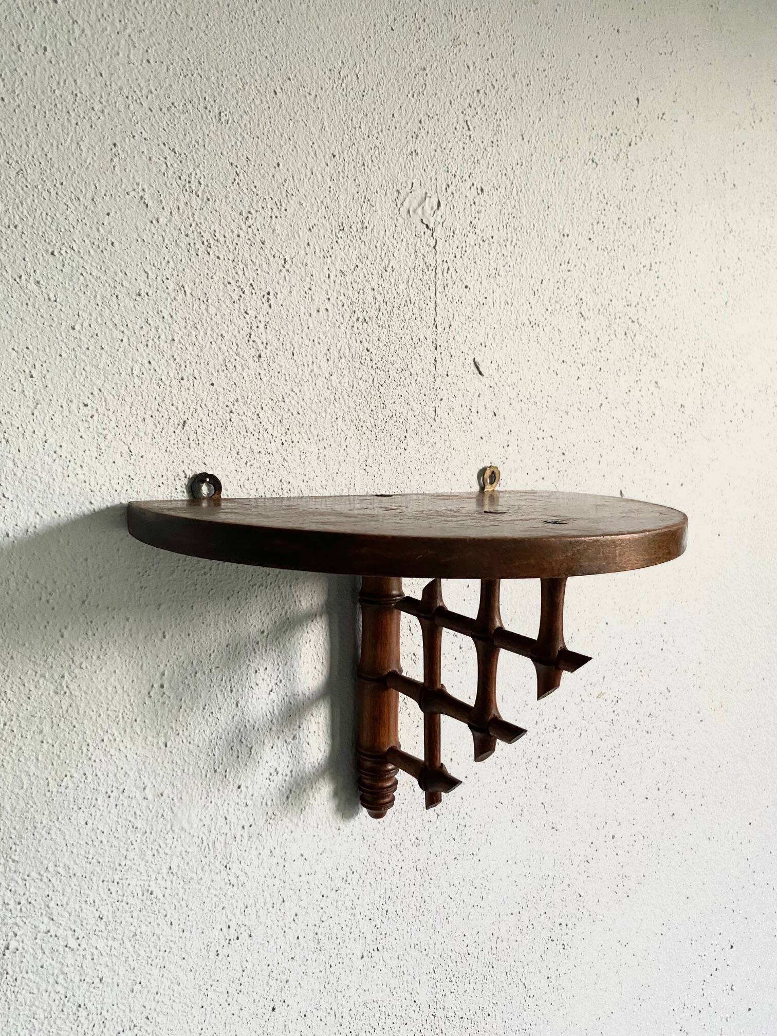 Wooden wall shelf, bamboo sculpture