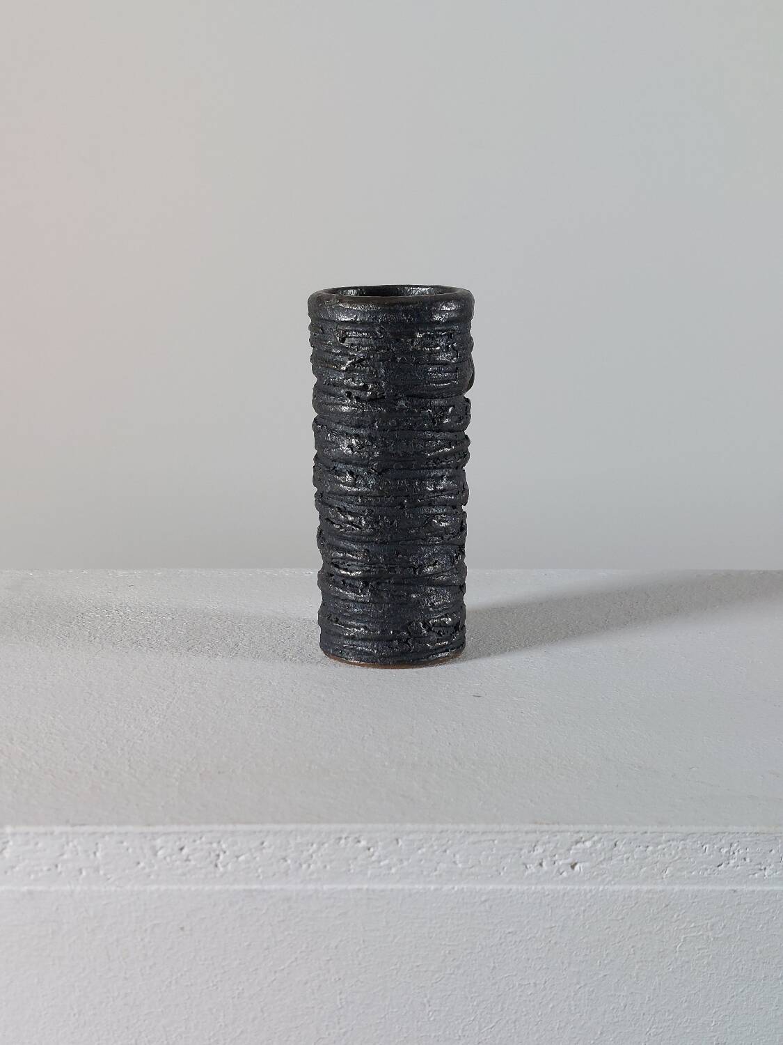 Small vintage brutalist vase with oxidised glaze from the 1950s.