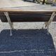 Antique garden bench made of cast iron and oak slats