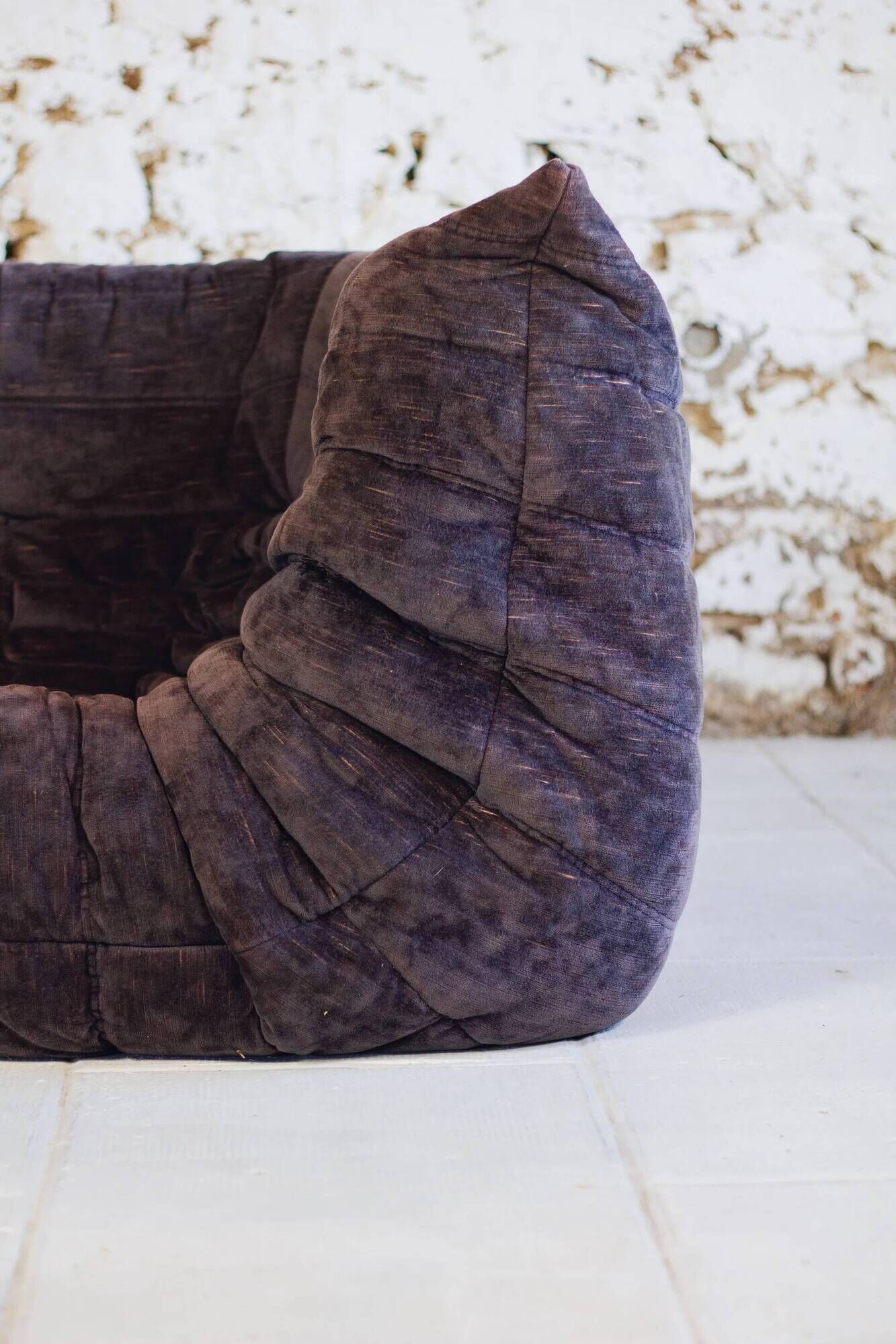 Togo aubergine corner armchair by Michel Ducaroy for Ligne Roset