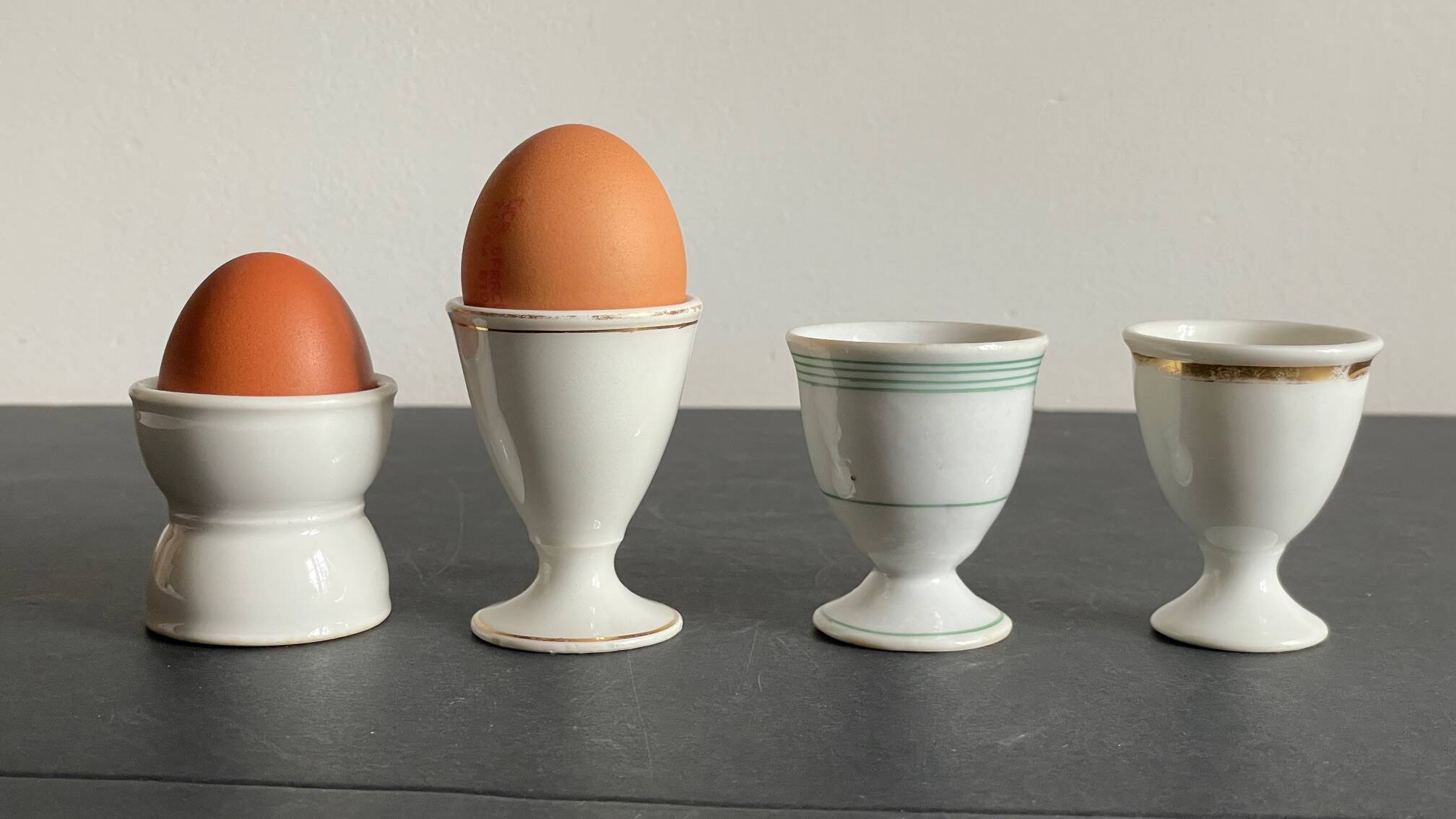 4 antique ceramic egg cups