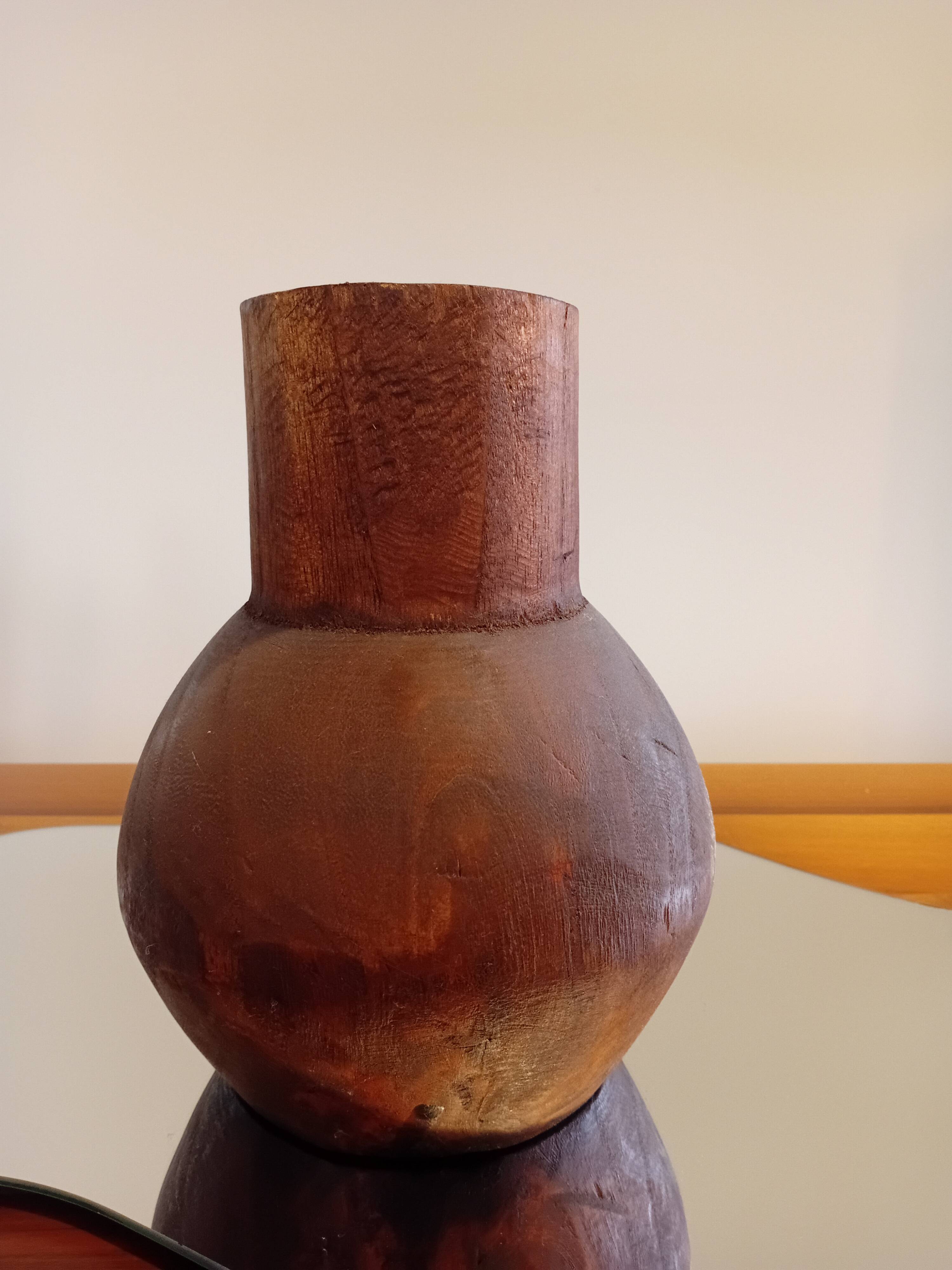 Carved wooden vase