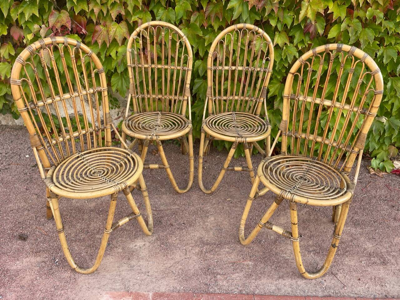 Series of 4 rattan chairs from the 60s