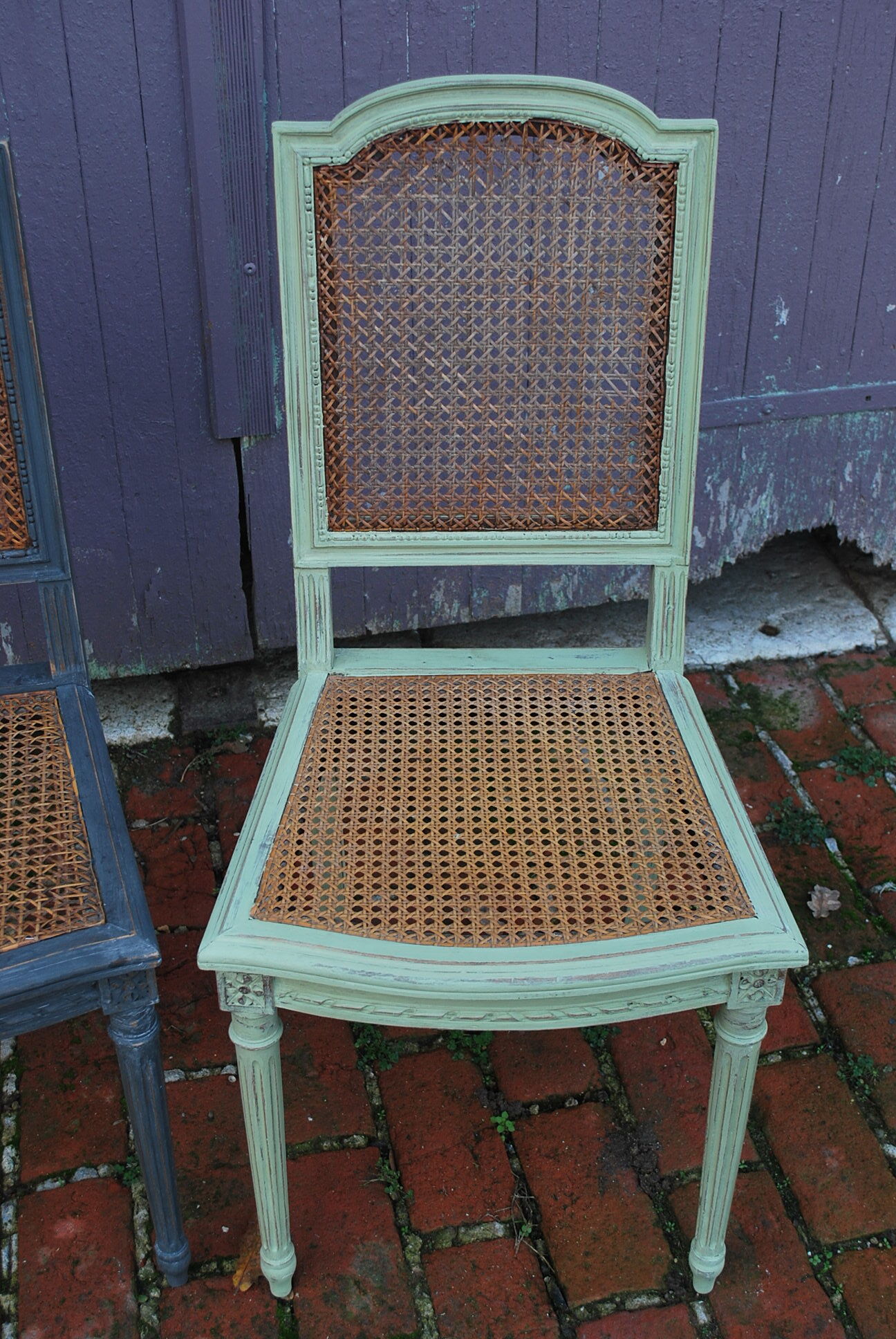 Duo of vintage chairs patinated