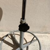 Adjustable and rotating industrial stool