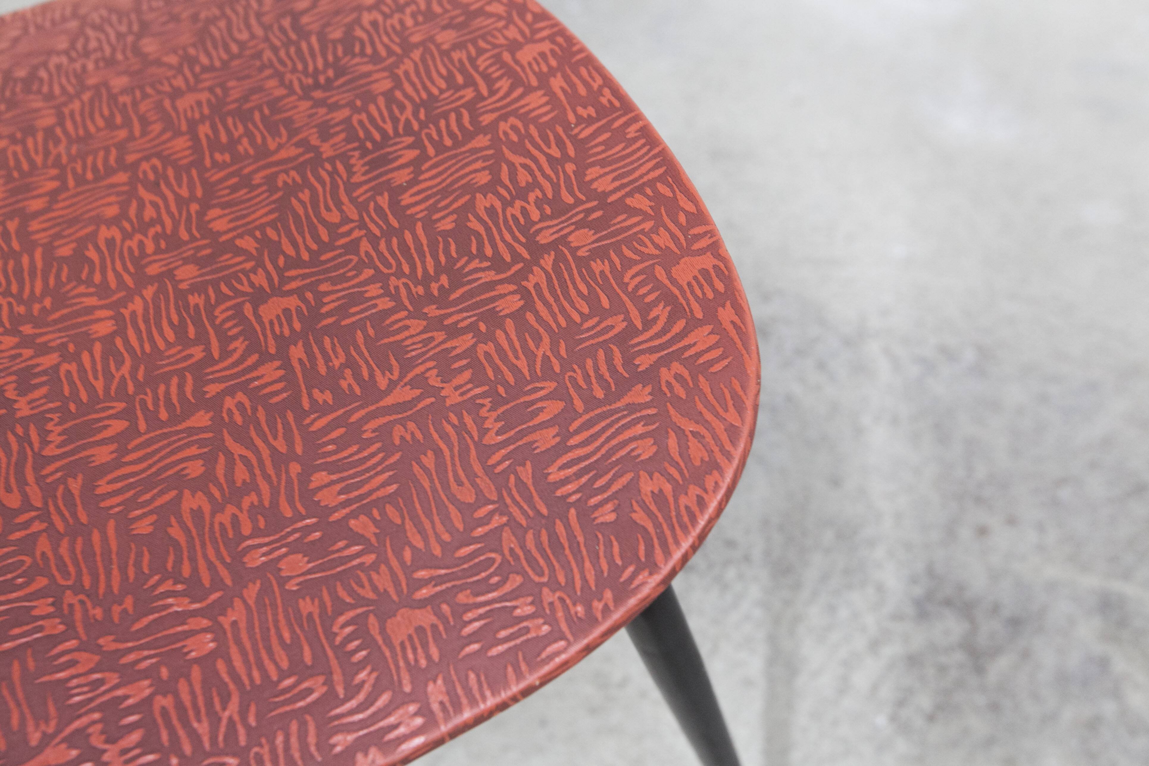 Vintage 70s chair in black lacquered metal and atypical red vinyl