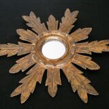Sun mirror in gilded wood