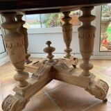 Oval solid walnut dining table on central leg with 4 extensions, 12/15 people