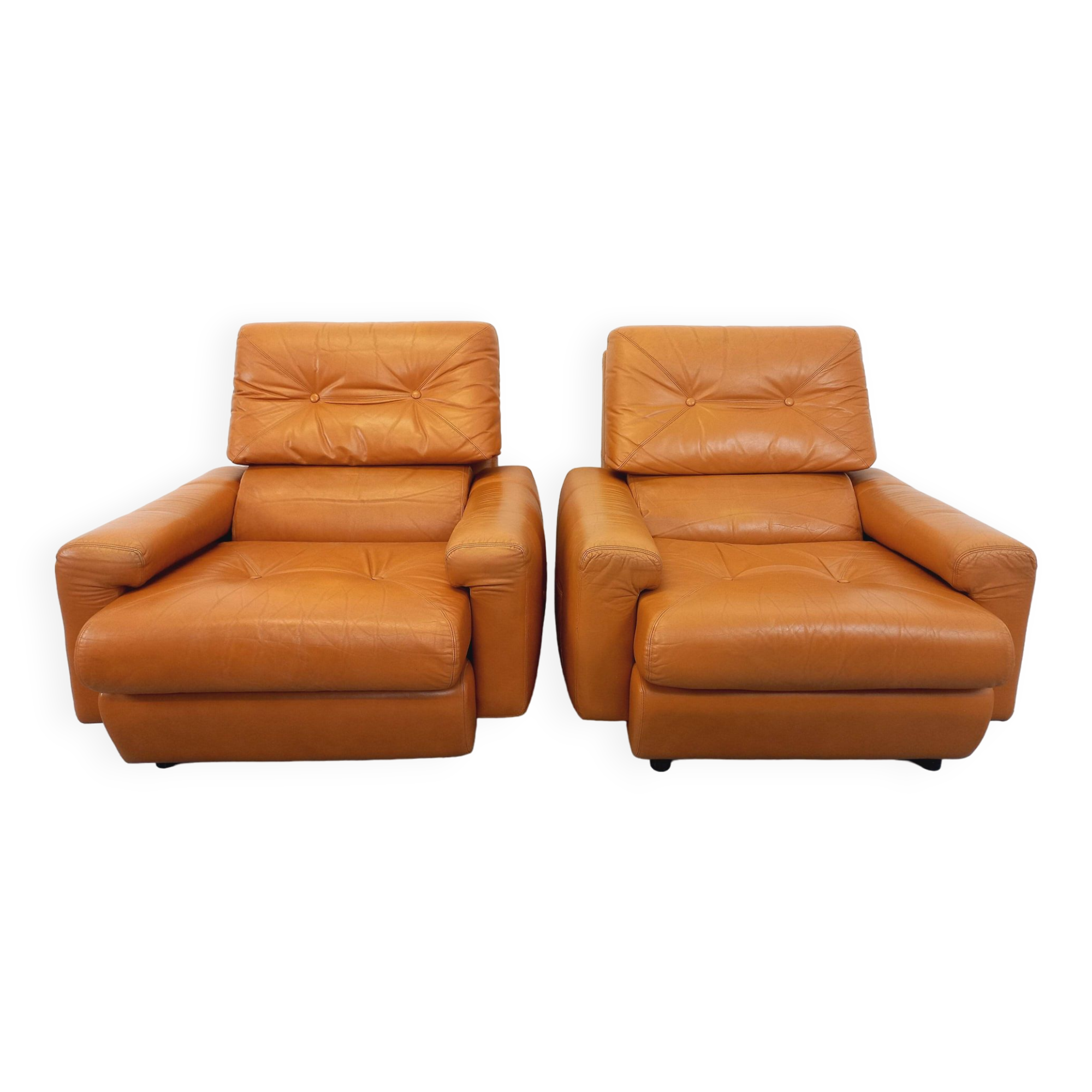 Pair of vintage leather lounge chairs from the 60s and 70s