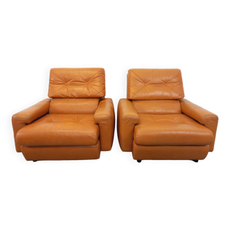 Pair of vintage leather lounge chairs from the 60s and 70s