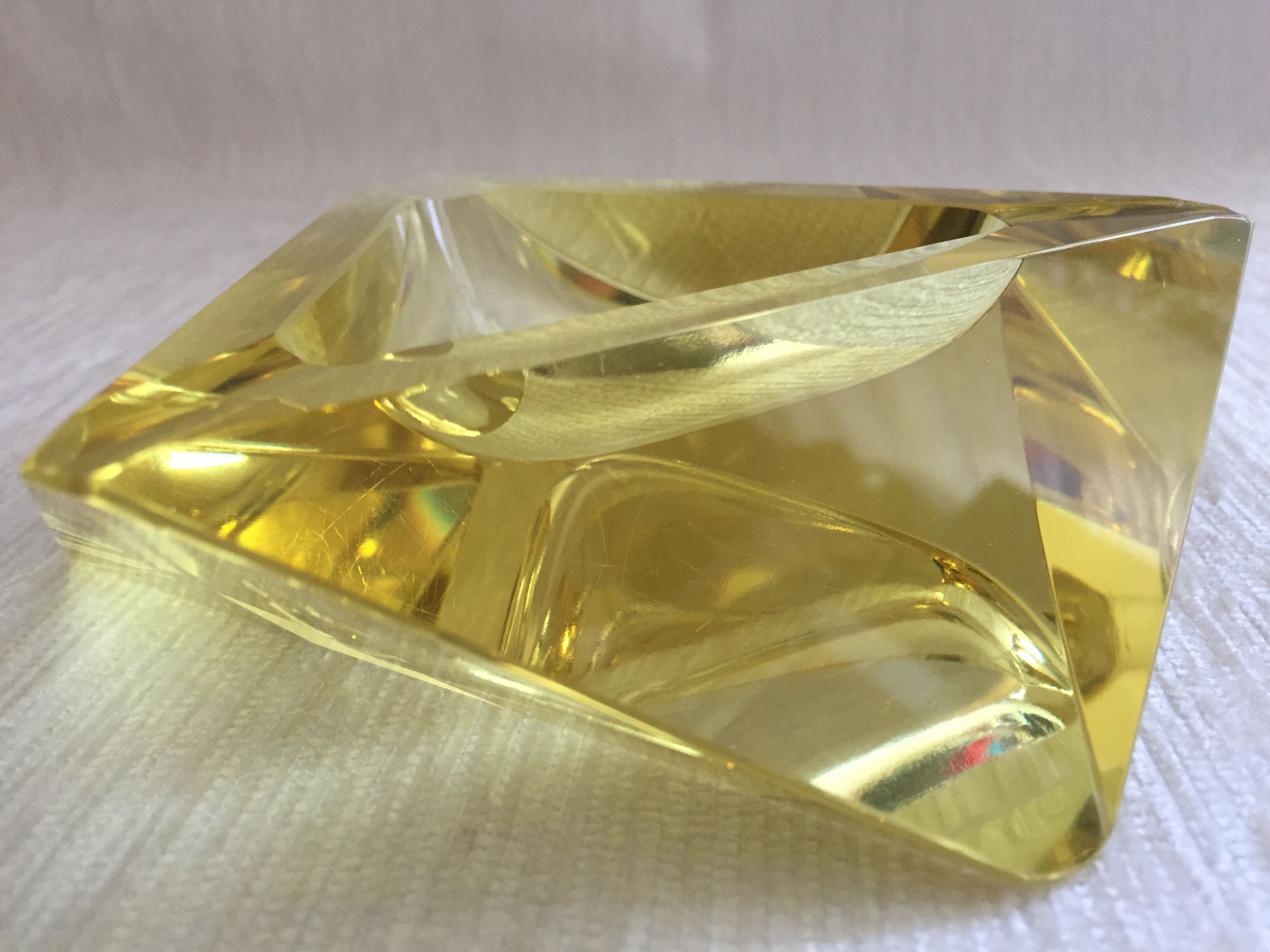 Diamond-shaped faceted ashtray