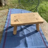 Small bench, footrest in artisanal raw wood