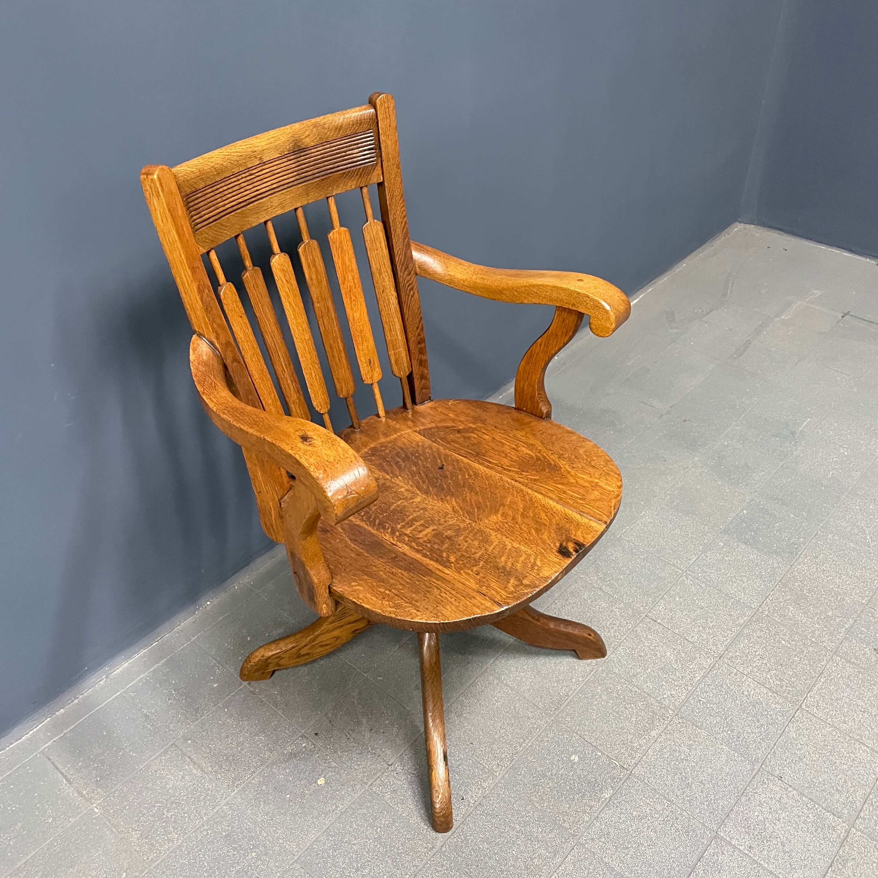 Antique American oak office chair with armrests 1920s