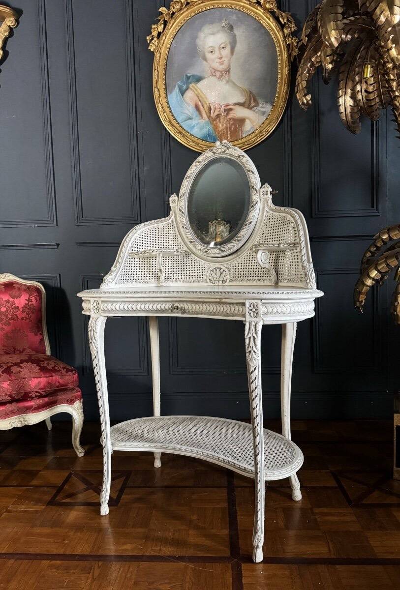 Coiffeuse du XIXe en bois peint et cannage de style Louis XVI