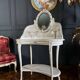 Coiffeuse du XIXe en bois peint et cannage de style Louis XVI