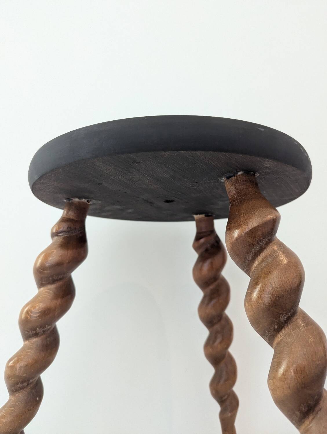 Wooden tripod stool