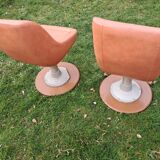 Original armchair on a cast iron base.