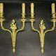 Pair of large wall sconces with flowers in the Louis XVI style from the 19th century - gilded bronze.