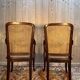 Pair of wide caned armchairs from the Art Nouveau period.