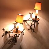 Pair of gilded metal sconces decorated with clovers.