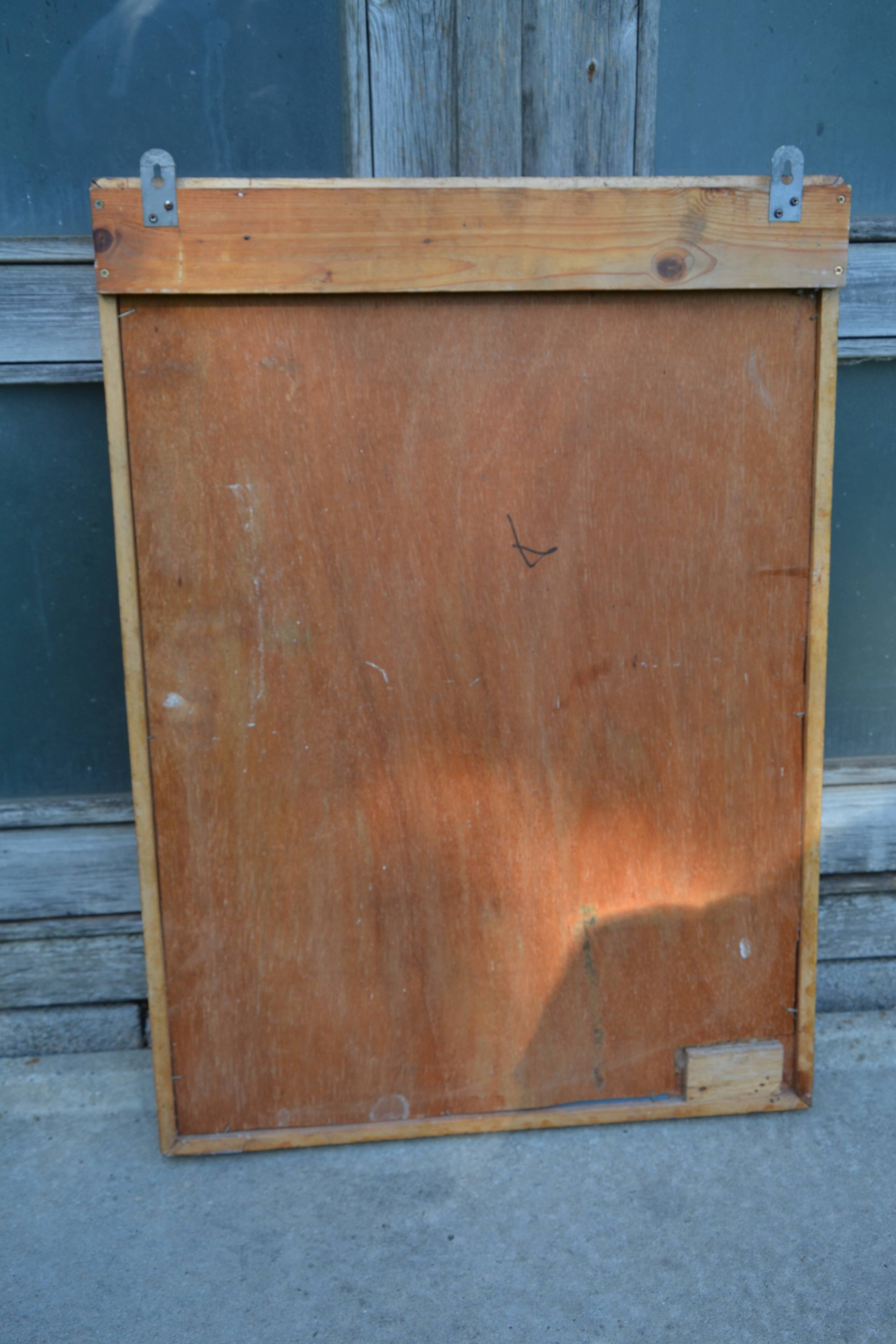 Large carved wooden mirror