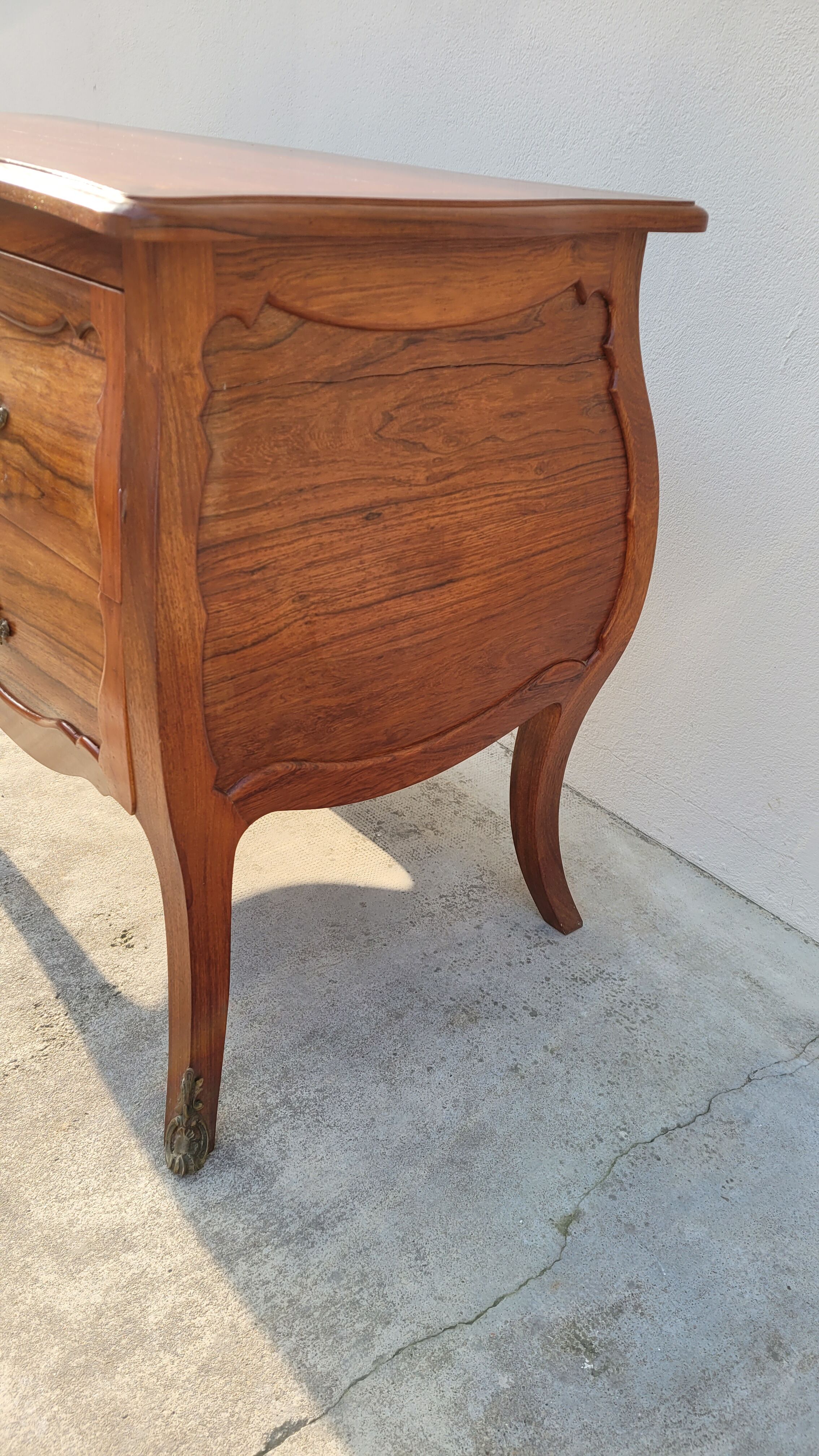 Curved Louis XV style commode in mahogany.