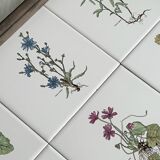 Old wooden plateau with floral tiles