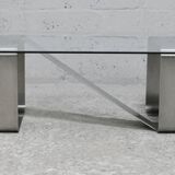 Coffee table with "kinetic" steel base and glass slab. Circa 1970.