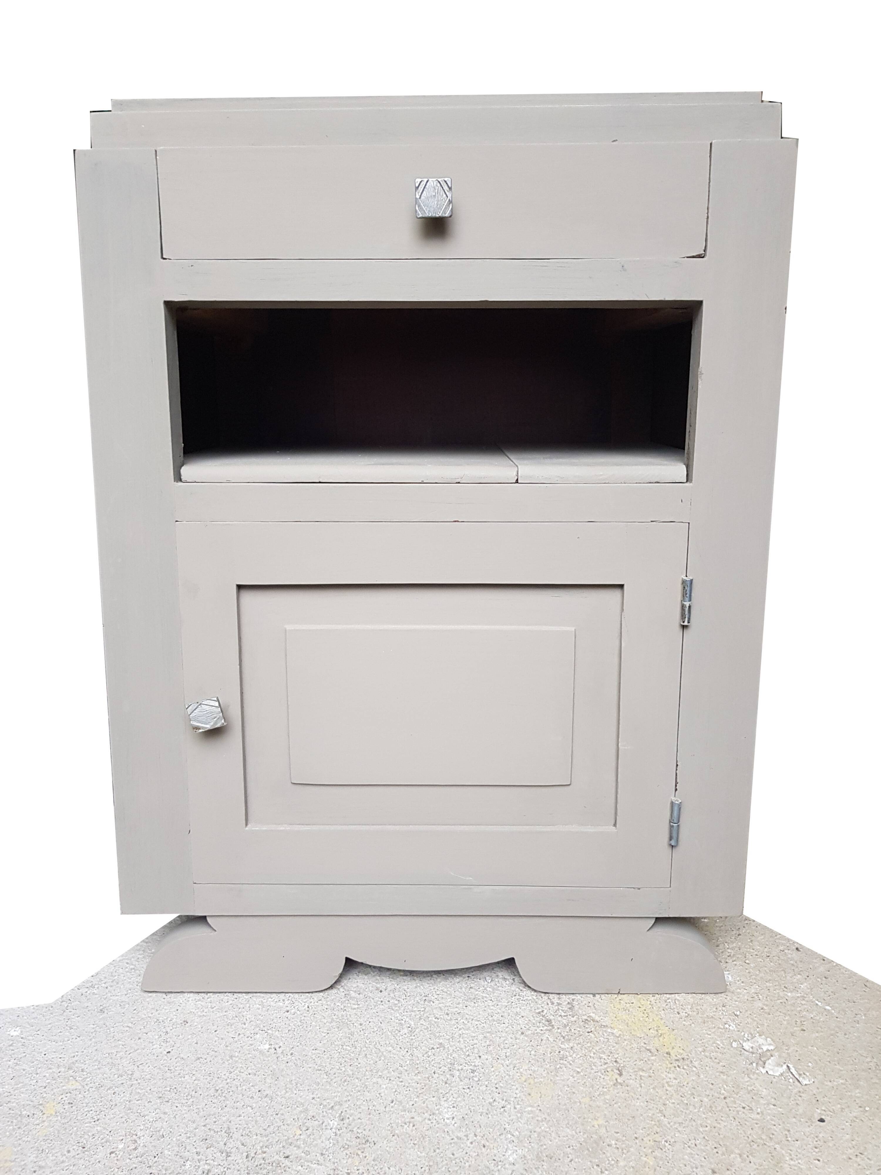 Wooden bedside drawer and a door