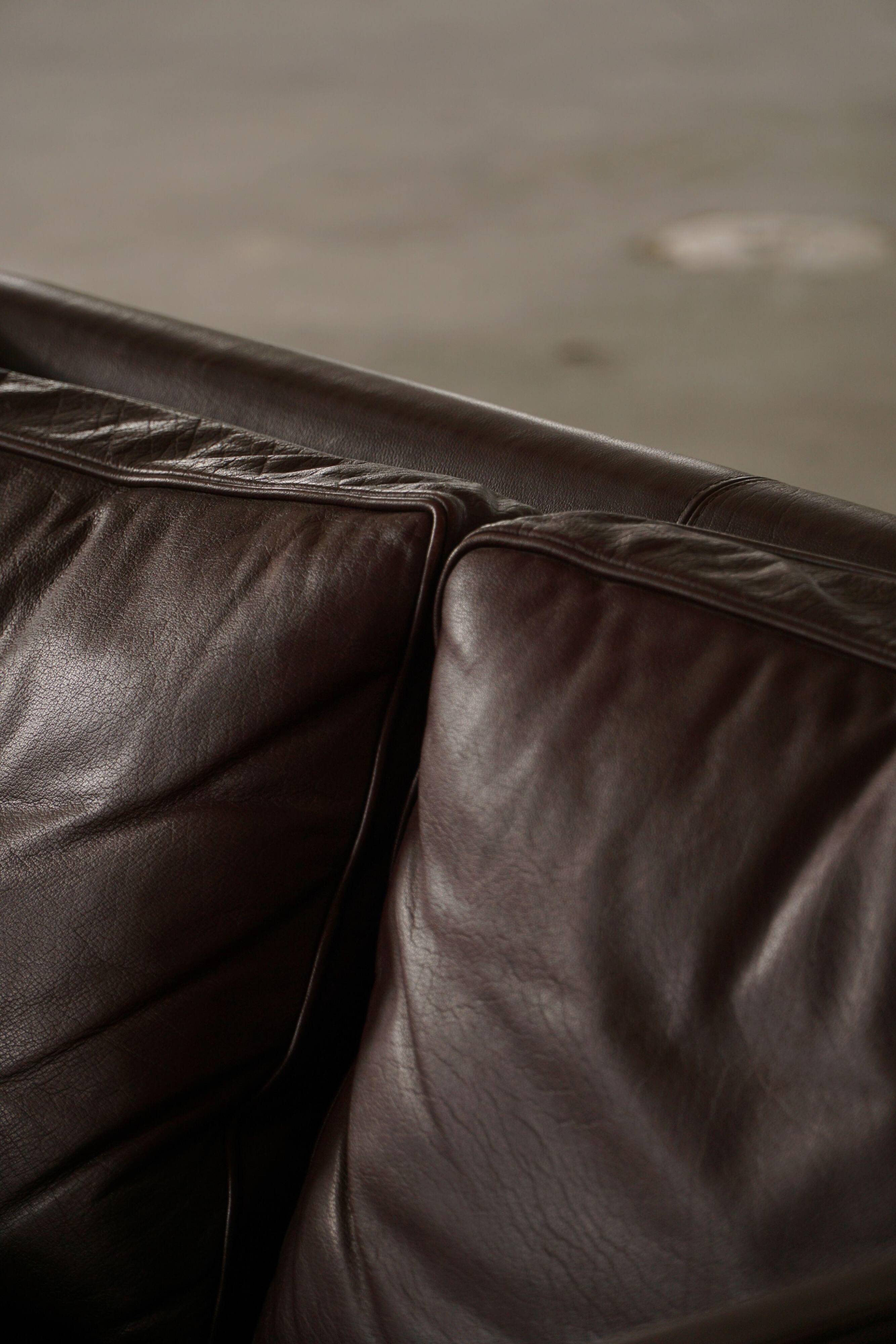 Stouby Møbelfabrik, two-seater sofa in mid-century style in brown leather, 1970s.