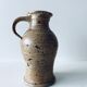 Pitcher in sandstone pyrity signed