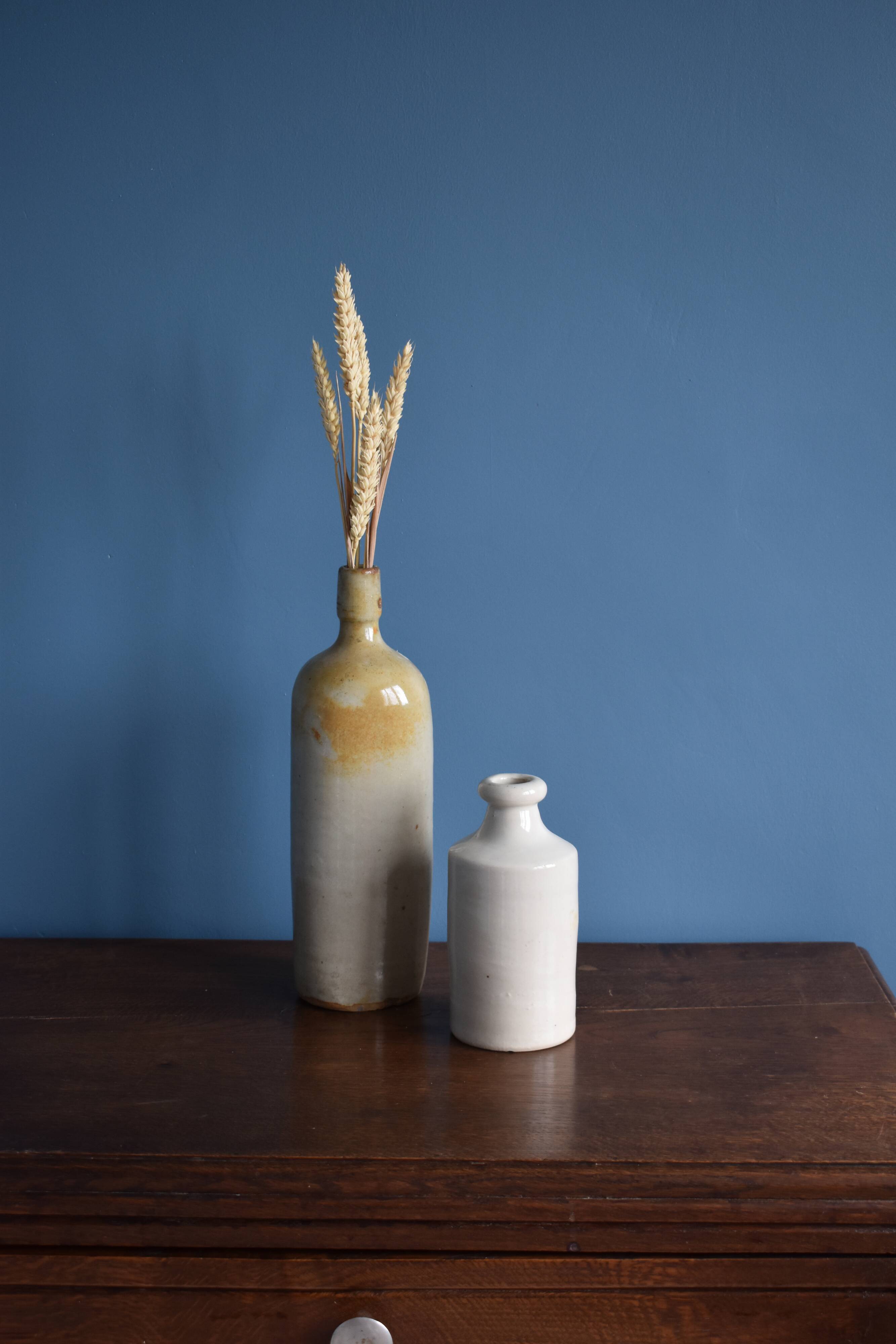 Old kettle and sandstone vase