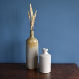 Old kettle and sandstone vase