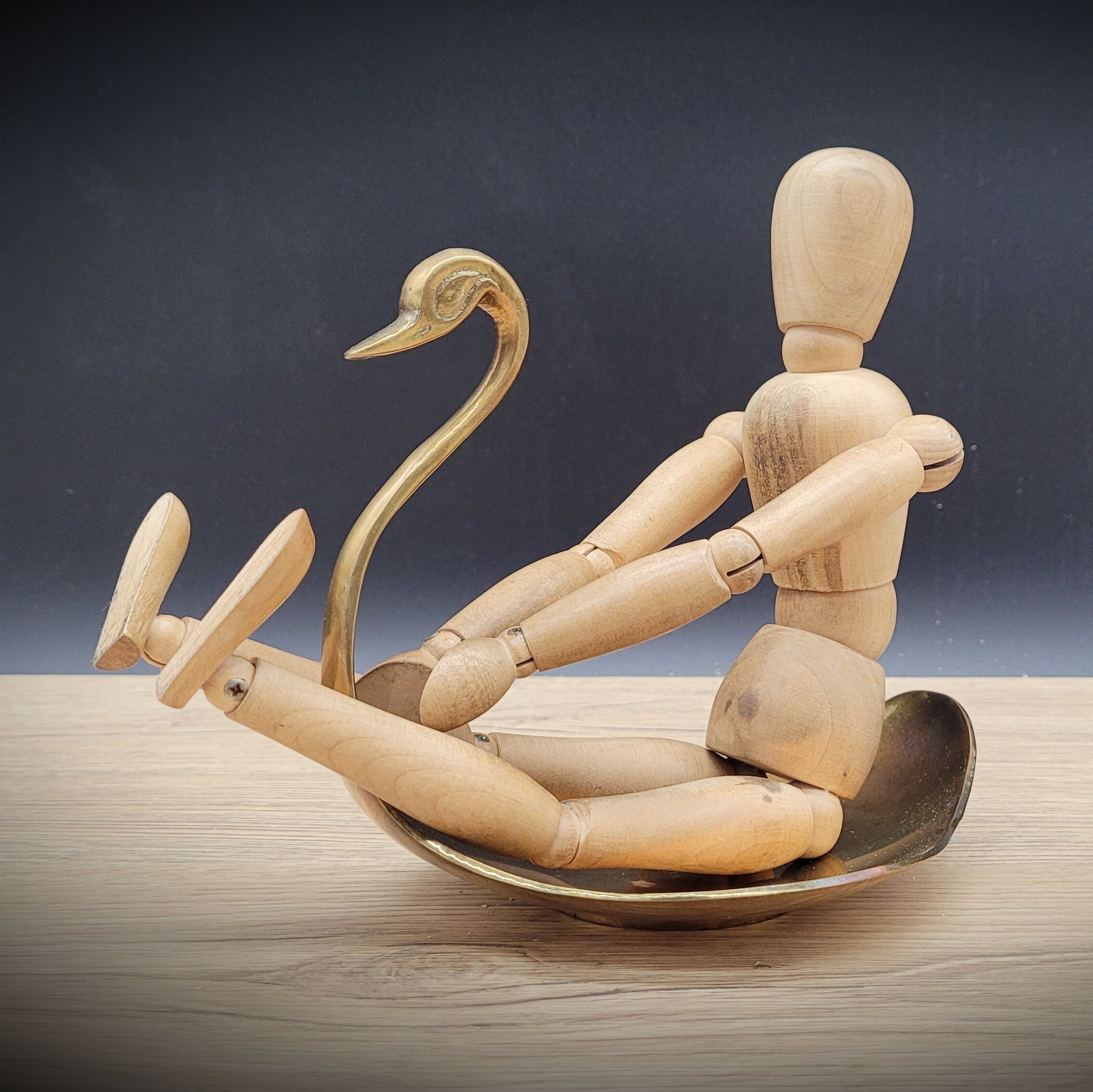 Empty swan brass pocket